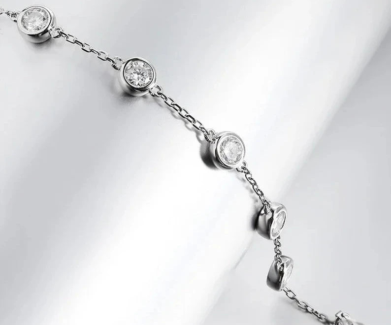 Tennis bracelet made with Moissanite Diamonds and Silver Plated 18K Rose Gold Links.
